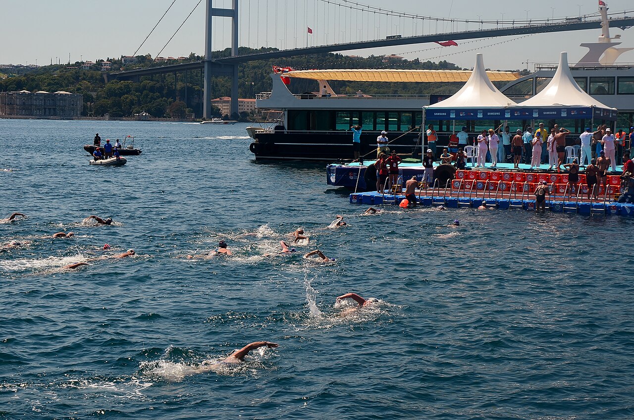 Swimmers approaching the finish of the Bosphorus Cross-Continental Swimming Race in Istanbul.